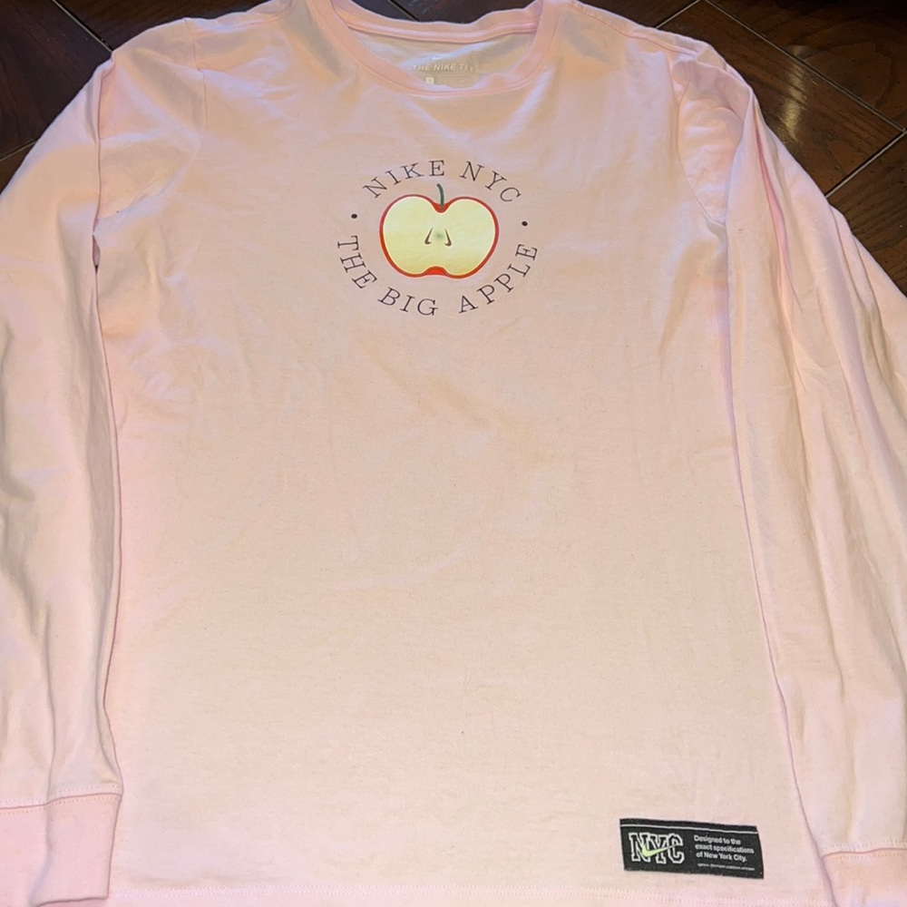 Nike NYC long sleeve tee. Logo on front and back. Pink color